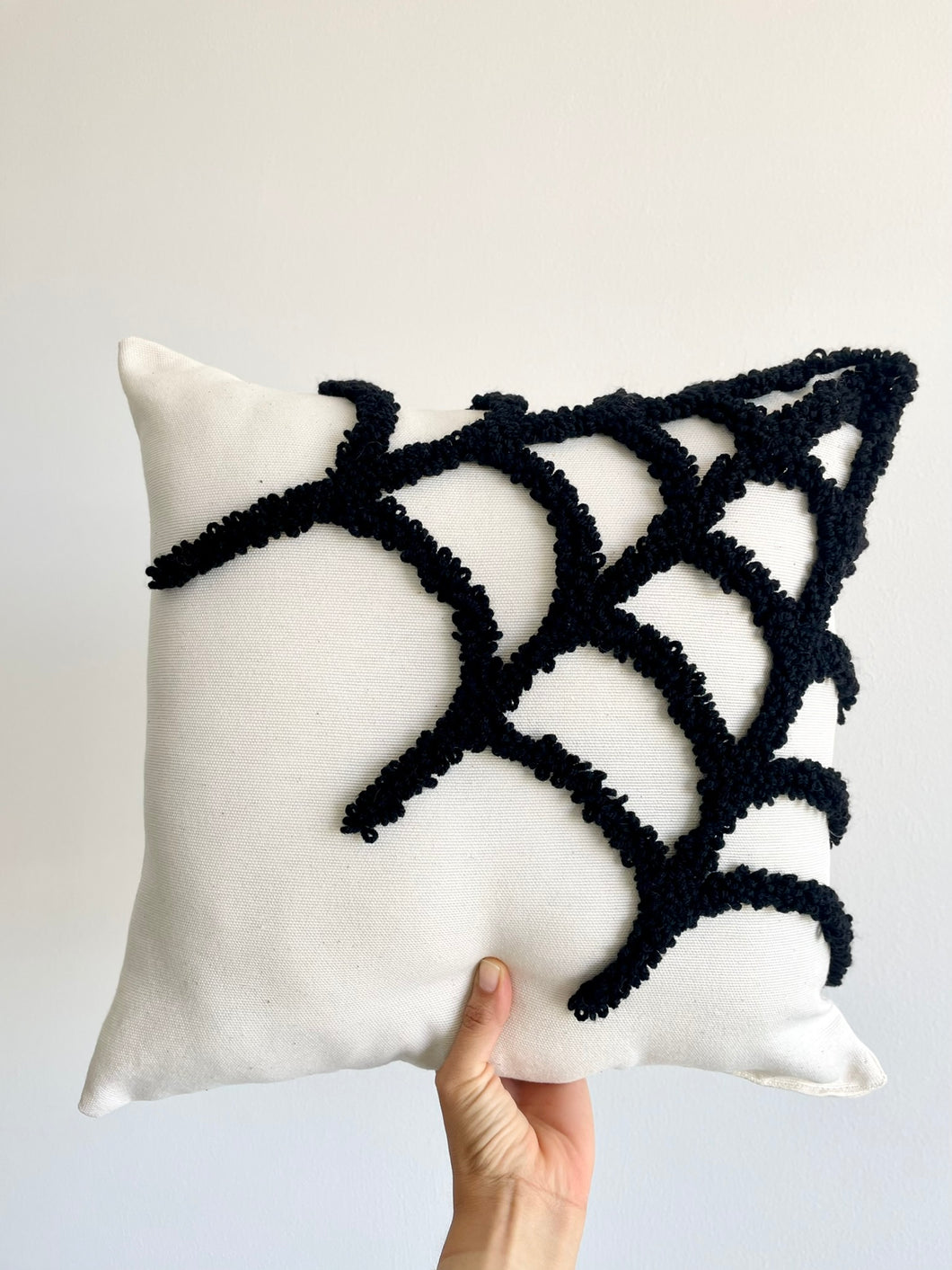 Cojin Telaraña