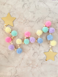 Guirnalda pompones, cuentas y estrellas