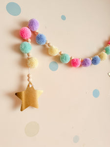 Guirnalda pompones, cuentas y estrellas